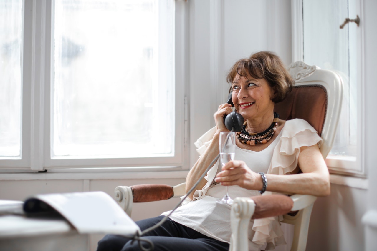 Bashful woman feels comfortable talking on the phone