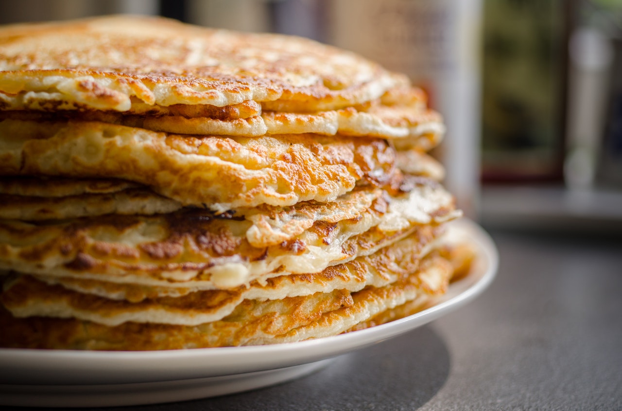 A plate of pancakes is a common breakfast food