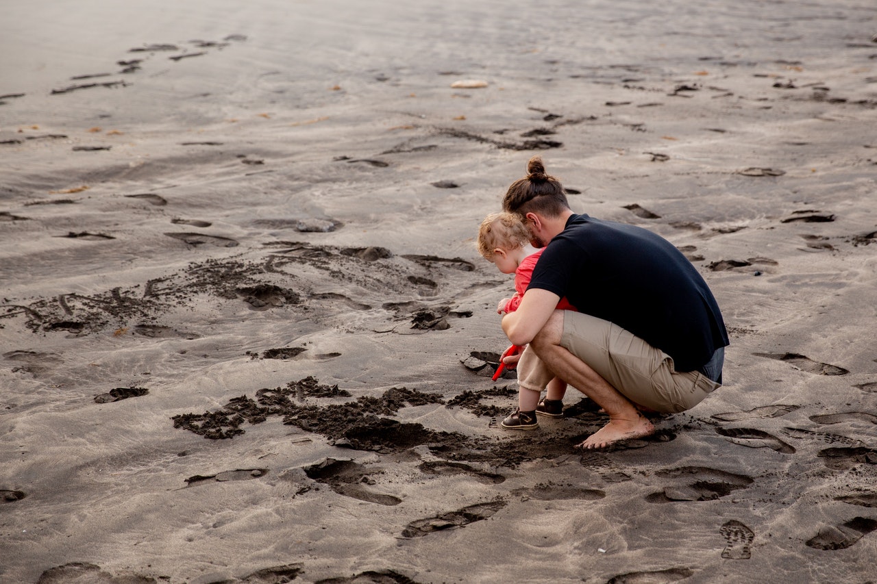 A Dad shares quality time with his toddler