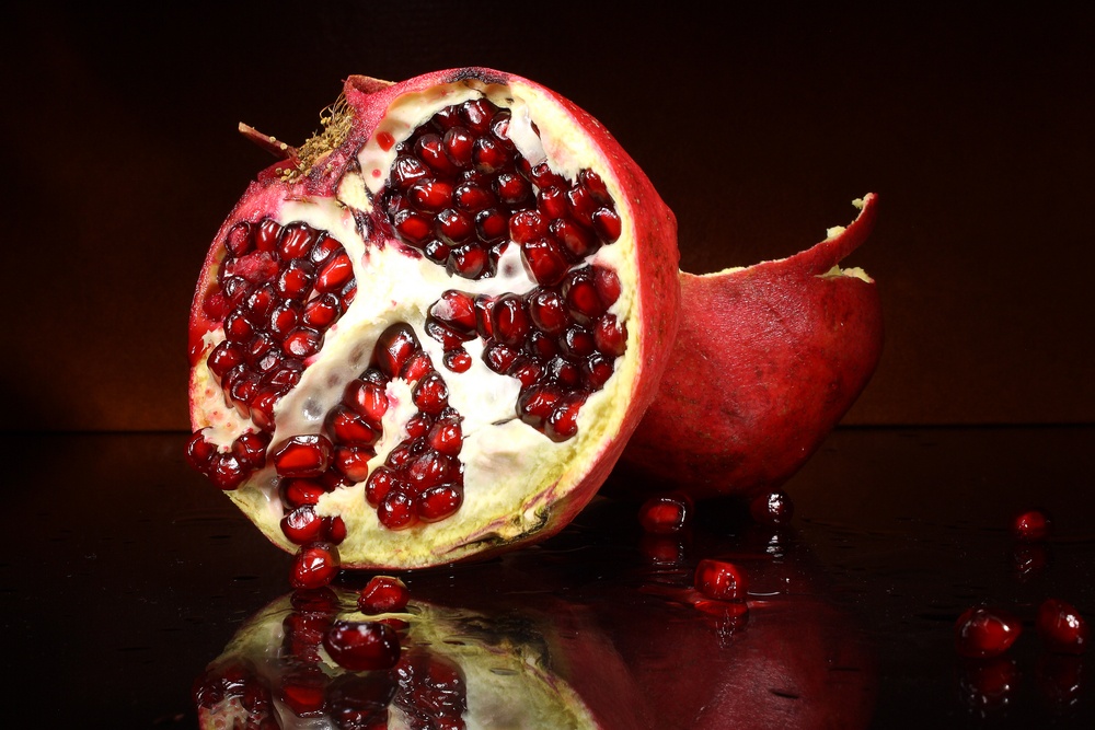 An open pomegranate is an invitation to adventure