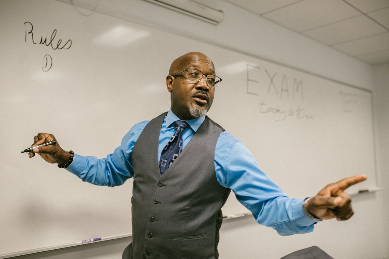 A professor tells the story of rocks, pebbles, sand and water poured into a jar